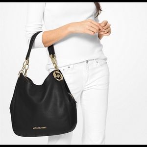 Black Leather Michael Kors bag. Used a few times only